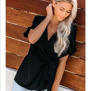 “Only contender wrap top” Brand new with tags!